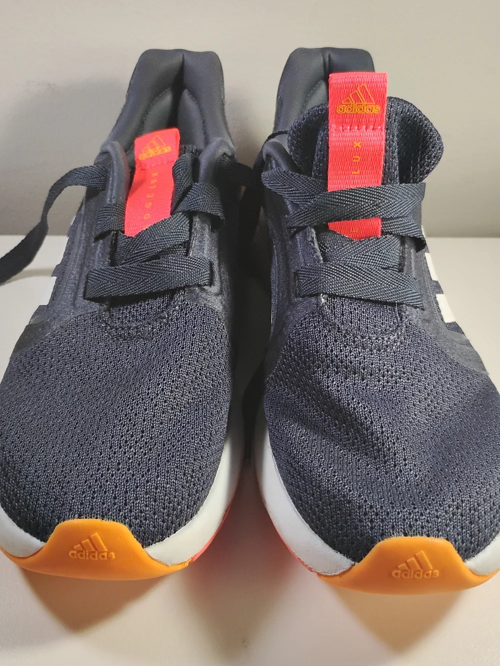 adidas Edge Lux 5 Women Navy Knit Running Sneakers with Neon Orange Accents